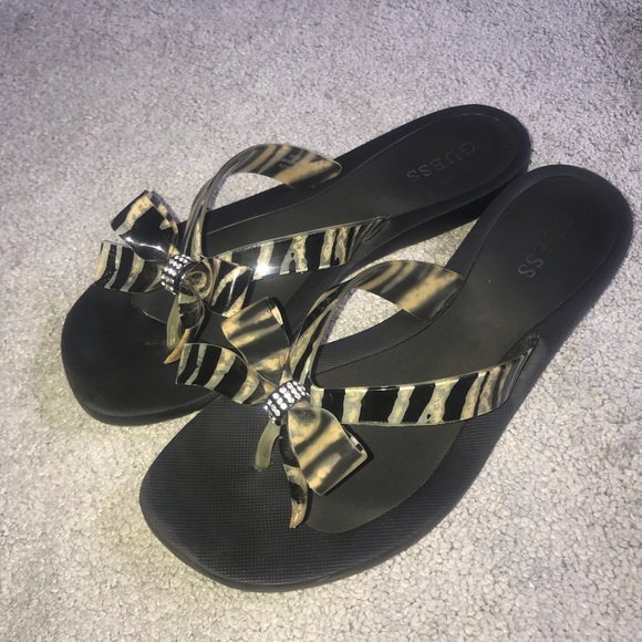 guess bow tie flip flops